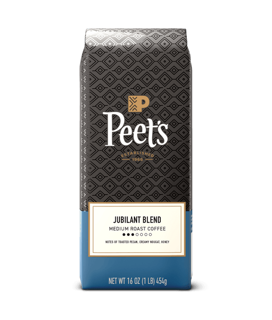 Peet's coffee Jubilant blend coffee bag with black and blue design on a green background
