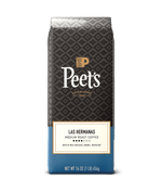 Peet's coffee las hermanas bag with a geometric pattern on a green background
